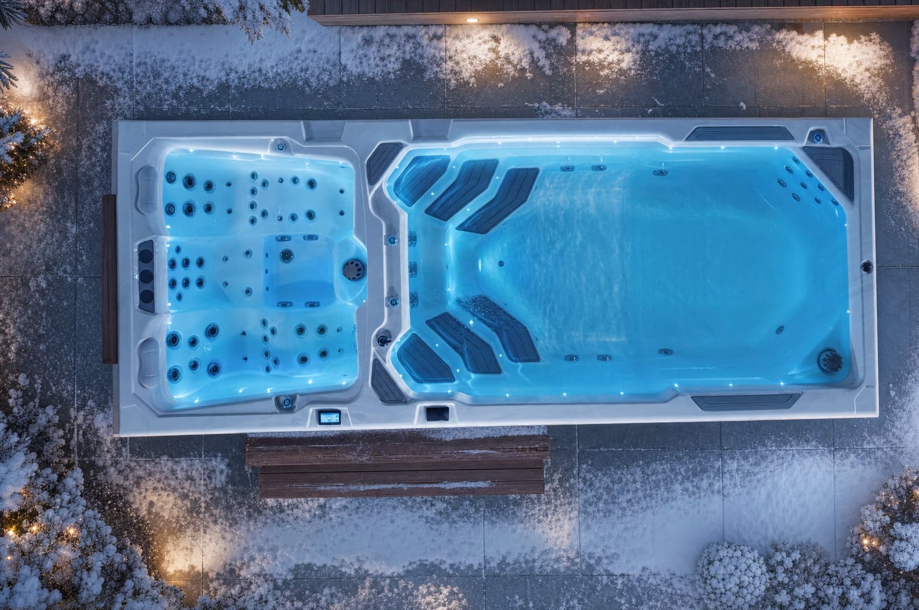 Swim spa Nautilus XXL Prime Canadian Spa zimą — śnieg wokół i para nad wodą